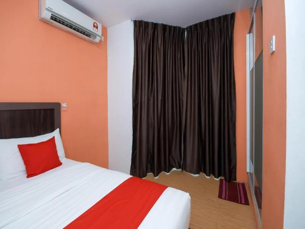 Bed in OYO 1111 Harmony Stay