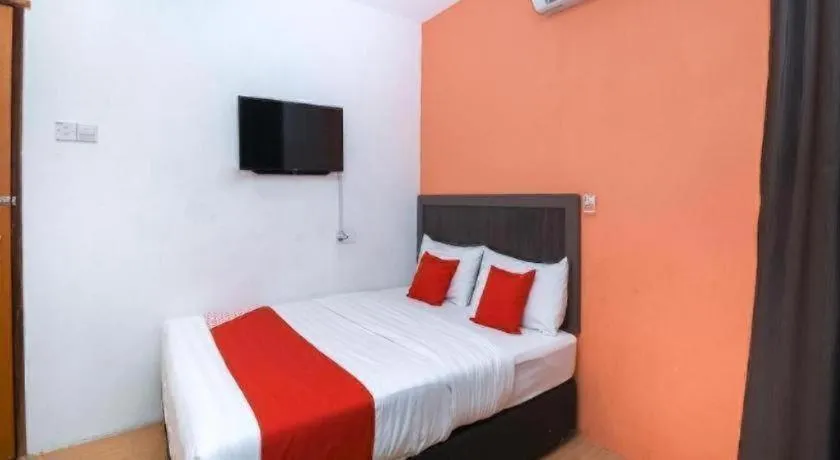 Bed in OYO 1111 Harmony Stay