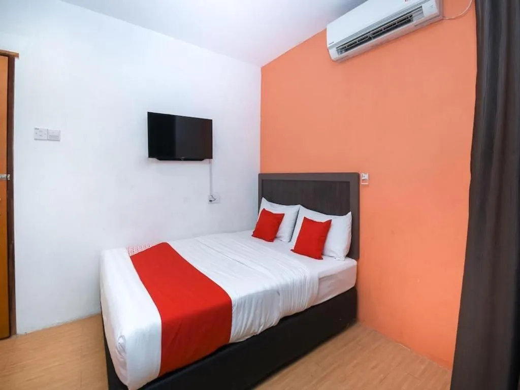 Bed in OYO 1111 Harmony Stay