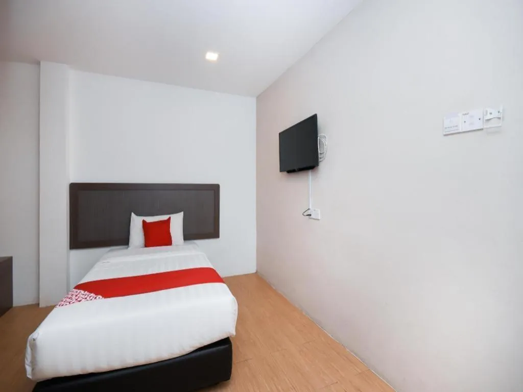 Bed in OYO 1111 Harmony Stay