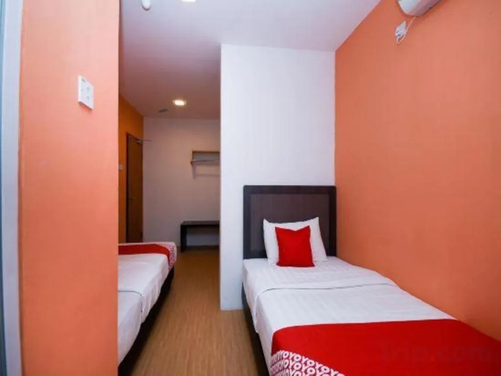 Bed in OYO 1111 Harmony Stay