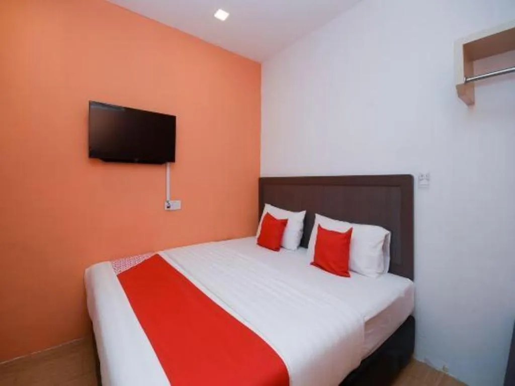 Bed in OYO 1111 Harmony Stay