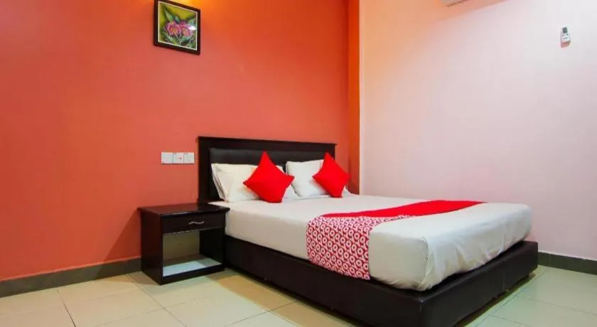 Bed in OYO 11343 Hotel Putra Iskandar