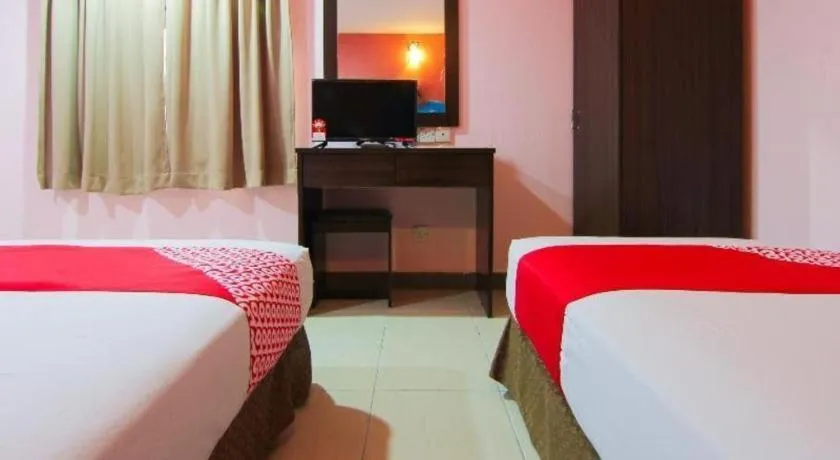 Bed in OYO 11343 Hotel Putra Iskandar