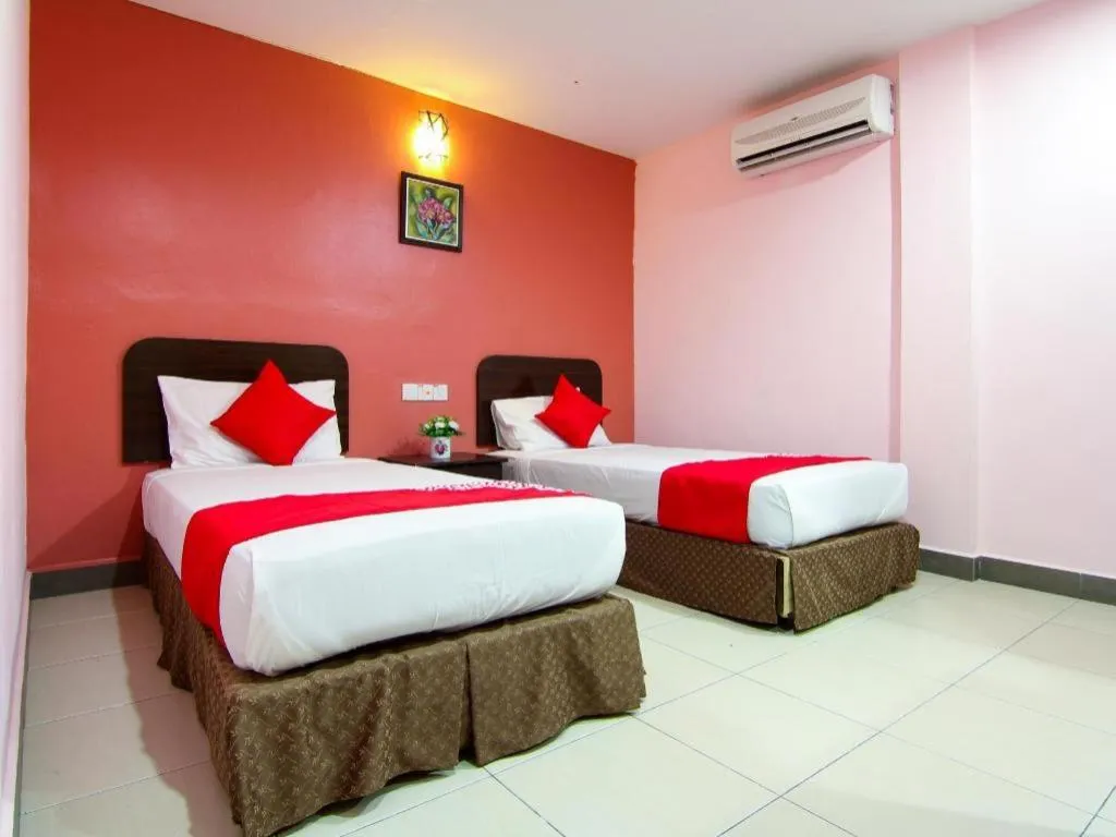 Bed in OYO 11343 Hotel Putra Iskandar