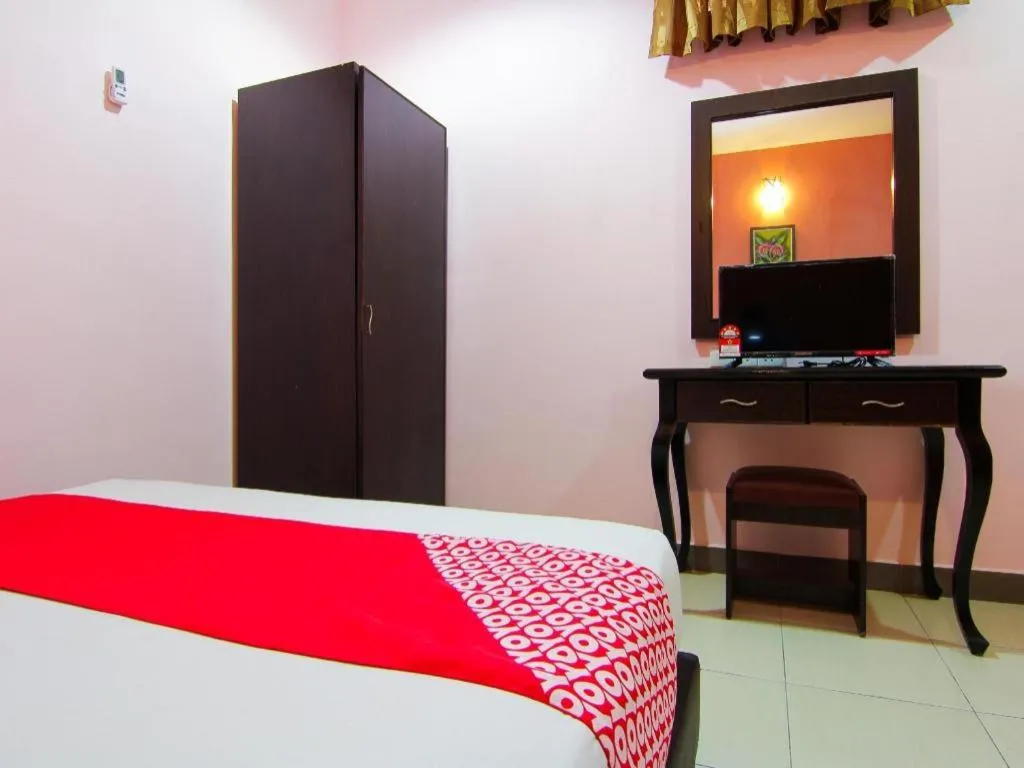 Bed in OYO 11343 Hotel Putra Iskandar