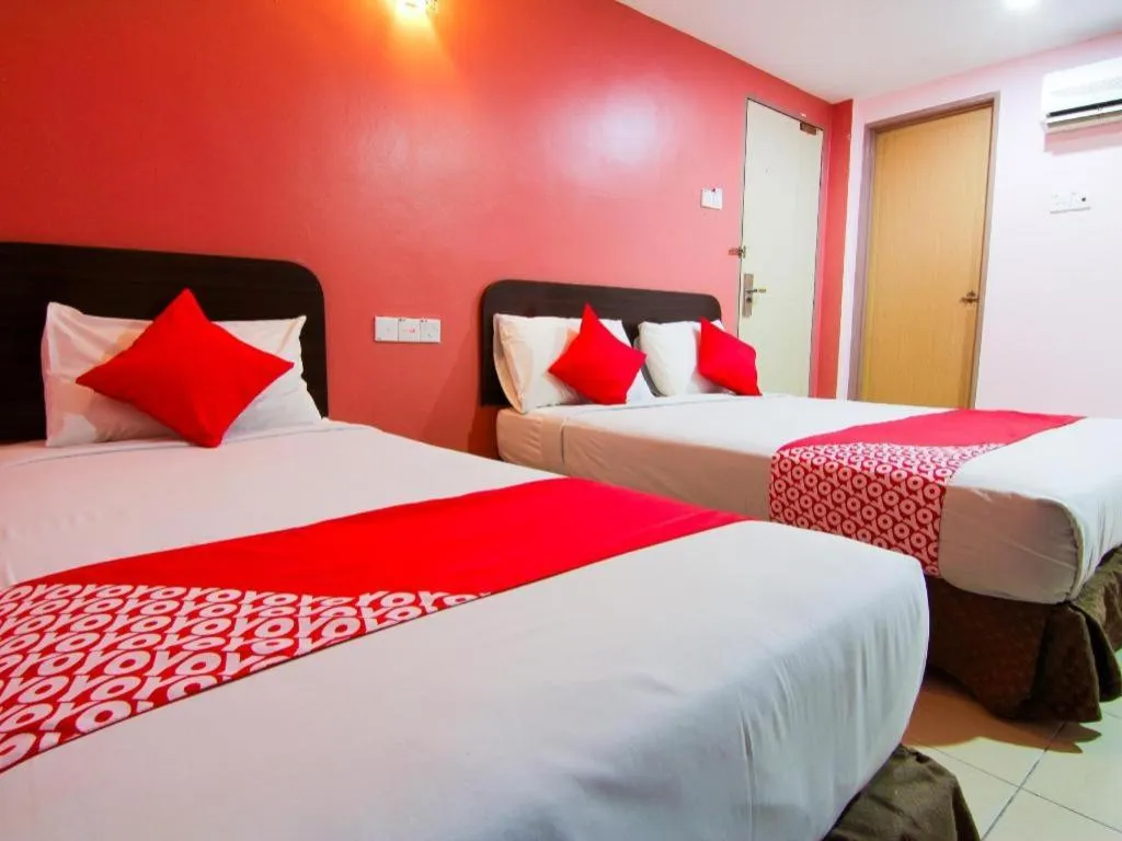 Bed in OYO 11343 Hotel Putra Iskandar
