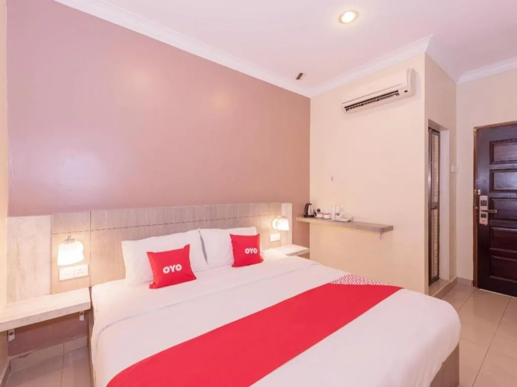 Bed in Capital O 89366 Spring Inn Hotel