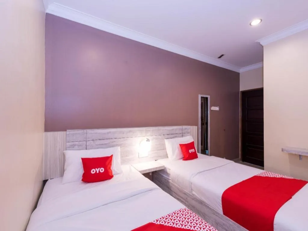 Bed in Capital O 89366 Spring Inn Hotel