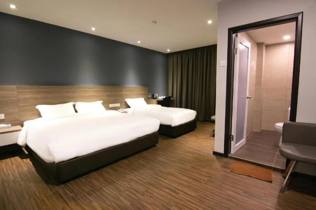 Bed in V Plus Hotel Ipoh