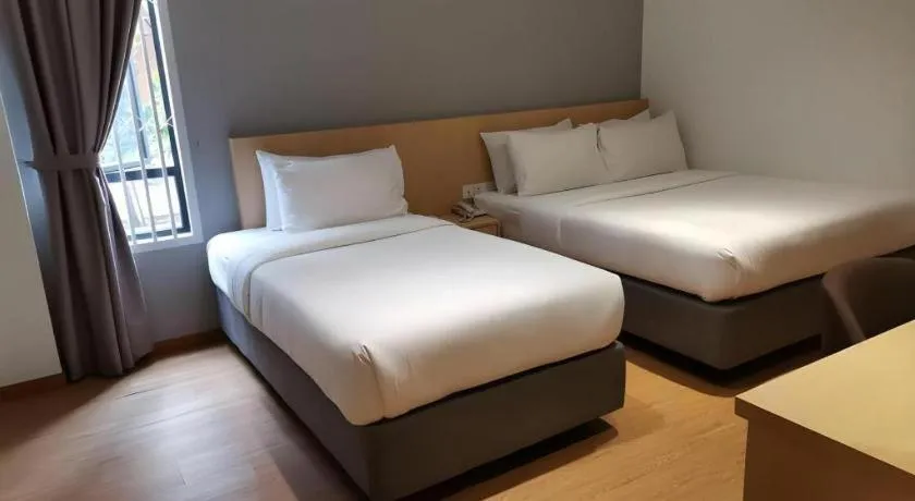 Bed in MIYABI HOTEL PERMAS