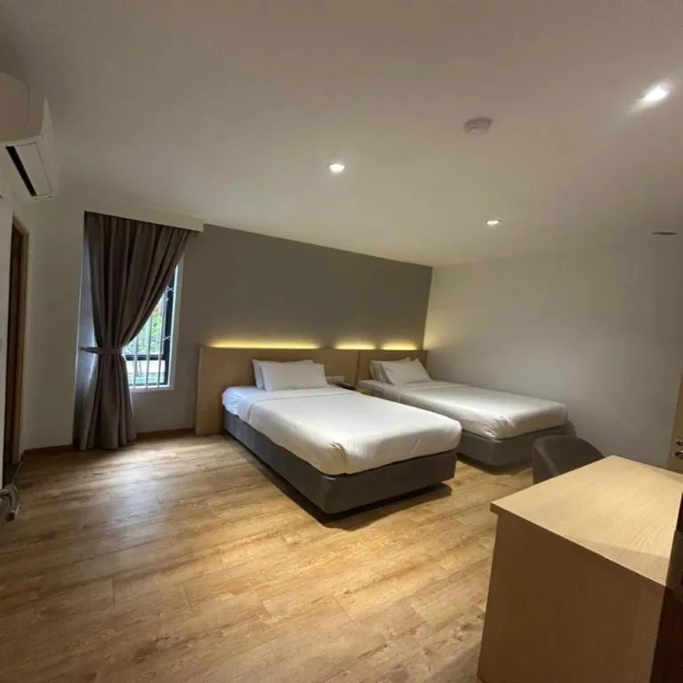 Bed in MIYABI HOTEL PERMAS