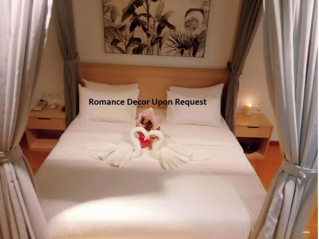 Bed in MIYABI HOTEL PERMAS