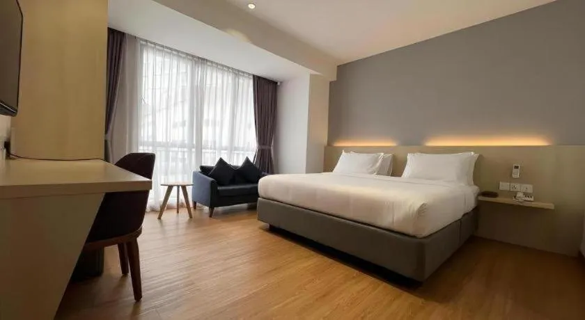 Bed in MIYABI HOTEL PERMAS