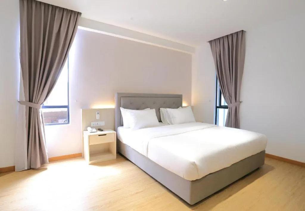 Bed in MIYABI HOTEL PERMAS