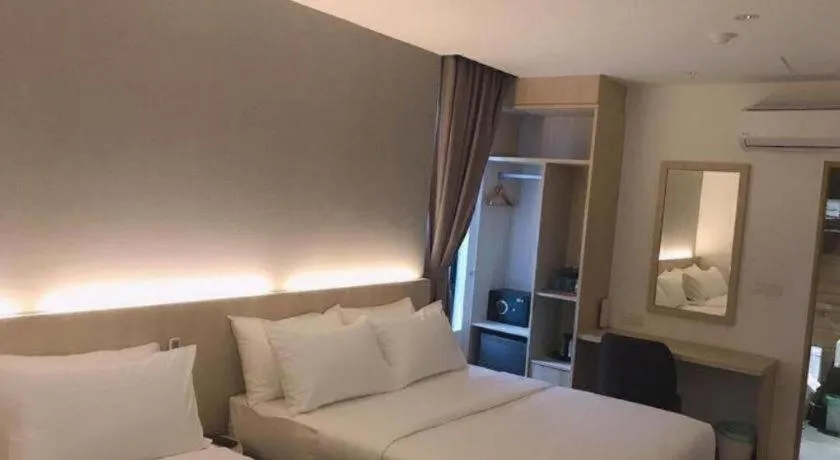 Bed in MIYABI HOTEL PERMAS