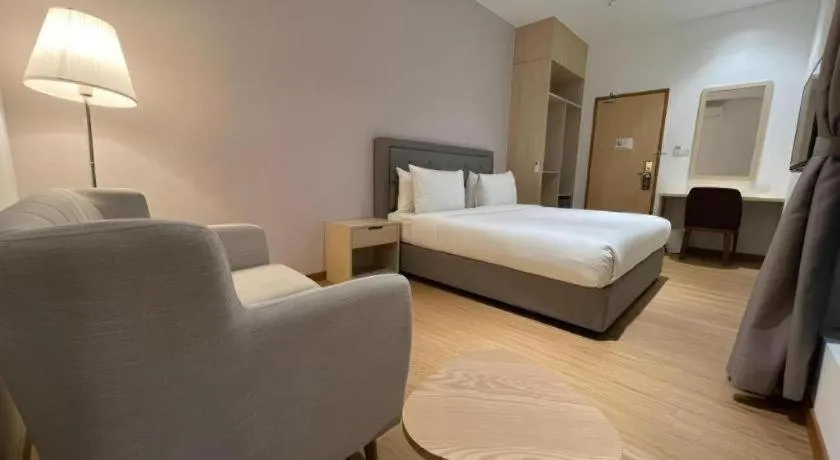 Bed in MIYABI HOTEL PERMAS