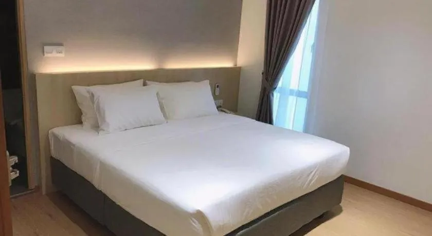 Bed in MIYABI HOTEL PERMAS