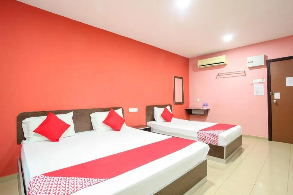 Bed in OYO 89539 Hotel Siswa