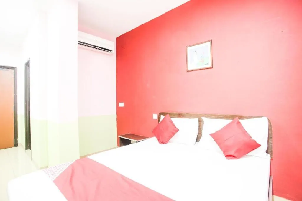 Bed in OYO 89539 Hotel Siswa