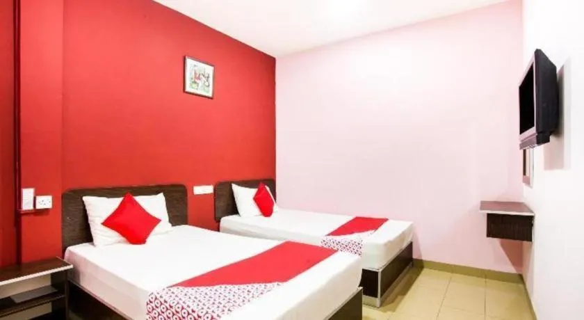 Bed in OYO 89539 Hotel Siswa
