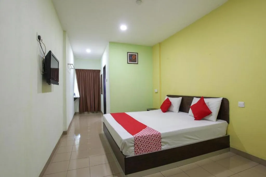 Bed in OYO 89539 Hotel Siswa