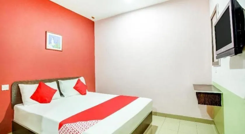 Bed in OYO 89539 Hotel Siswa