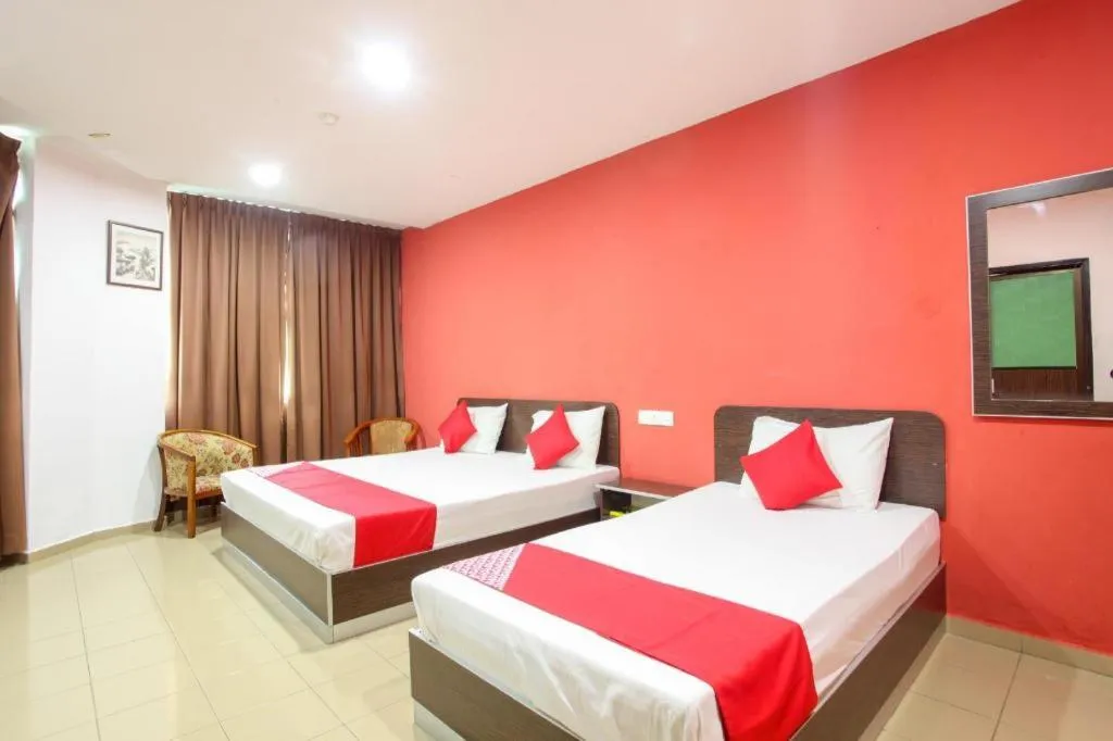 Bed in OYO 89539 Hotel Siswa