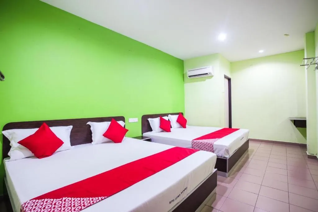 Bed in OYO 89539 Hotel Siswa