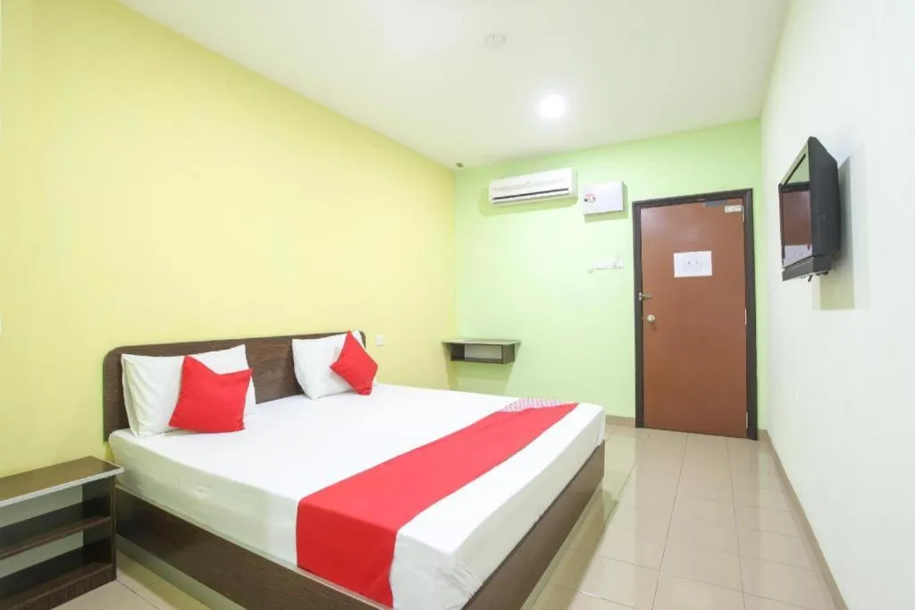 Bed in OYO 89539 Hotel Siswa