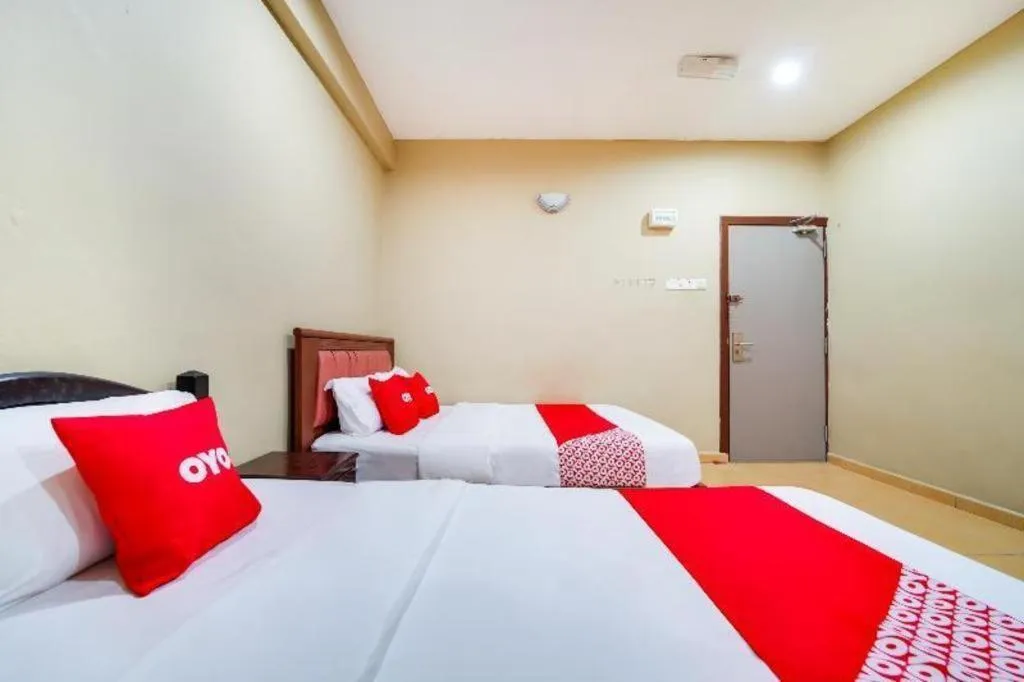 Bed in OYO 44058 MOTEL SRE BAYAM