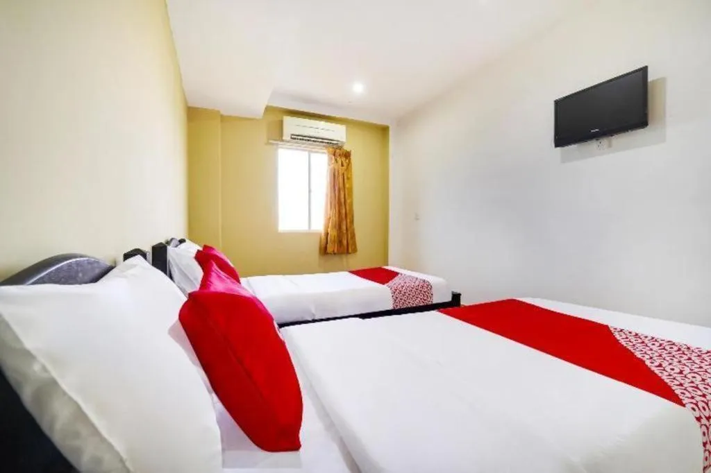 Bed in OYO 44058 MOTEL SRE BAYAM