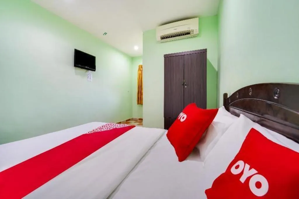 Bed in OYO 44058 MOTEL SRE BAYAM