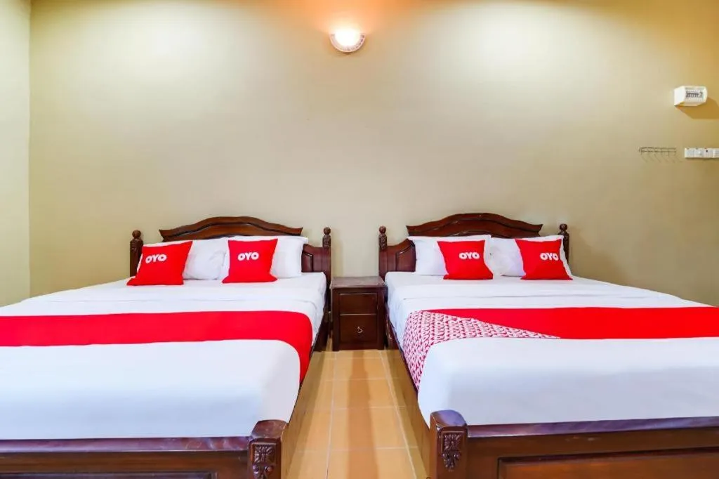 Bed in OYO 44058 MOTEL SRE BAYAM