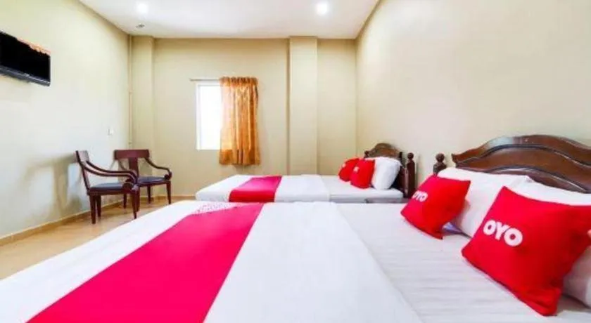 Bed in OYO 44058 MOTEL SRE BAYAM