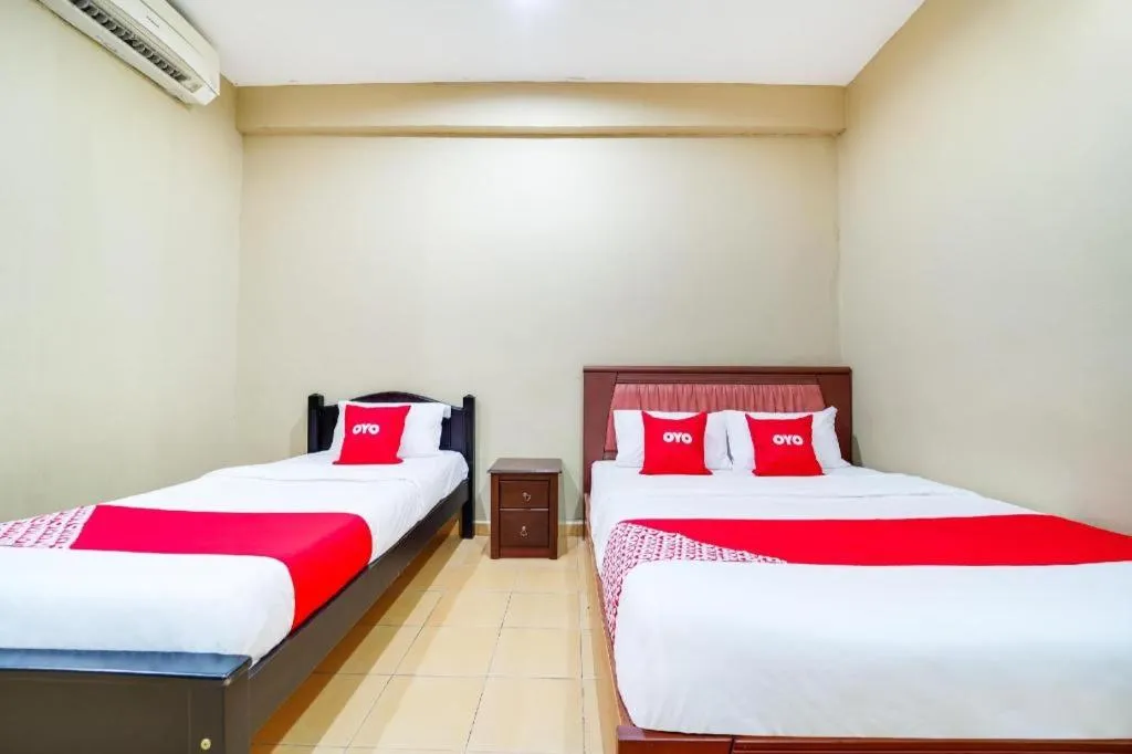 Bed in OYO 44058 MOTEL SRE BAYAM