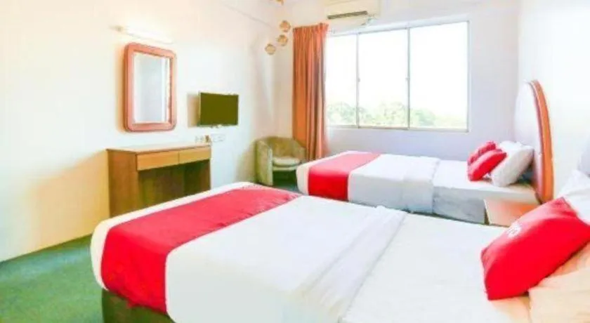 Bed in OYO 89638 Hotel Mandarin Inn