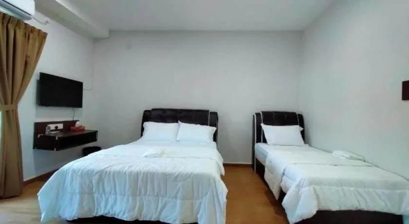 Bed in OYO 89859 PP Traveller's Hotel