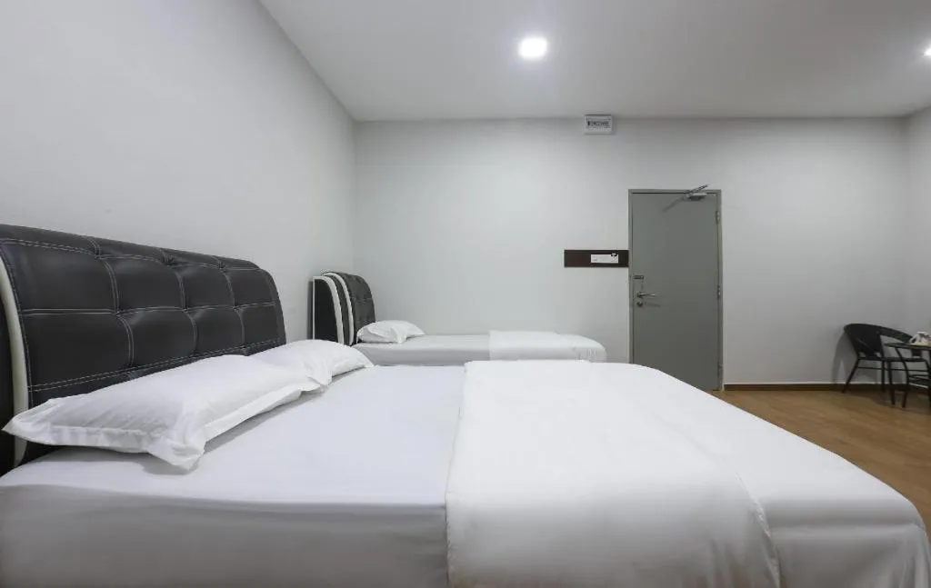 Bed in OYO 89859 PP Traveller's Hotel