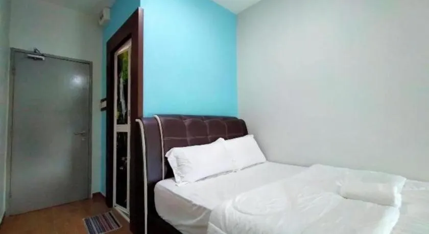 Bed in OYO 89859 PP Traveller's Hotel