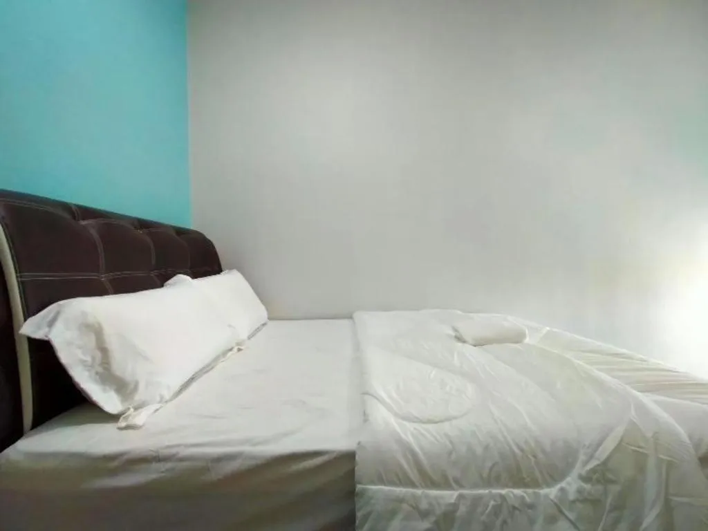 Bed in OYO 89859 PP Traveller's Hotel