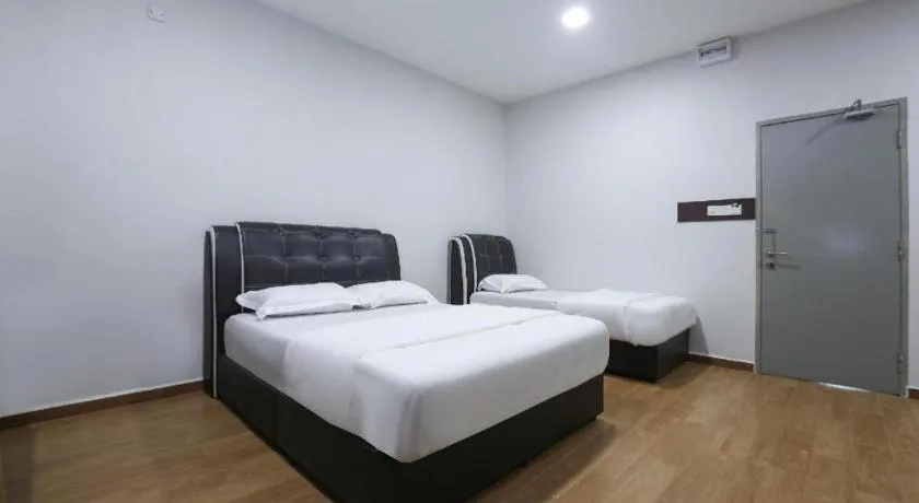 Bed in OYO 89859 PP Traveller's Hotel