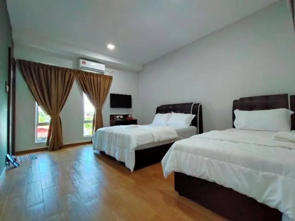 Bed in OYO 89859 PP Traveller's Hotel