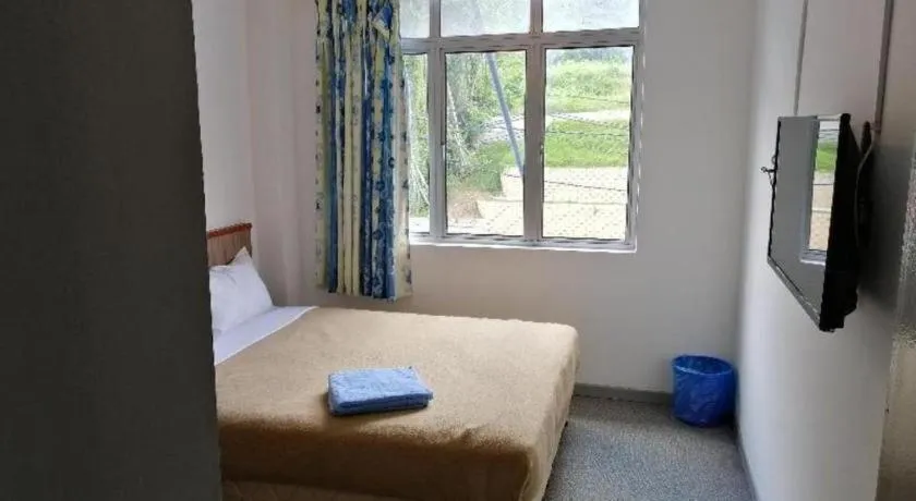 Bed in Capital O 89876 Safari Hotel