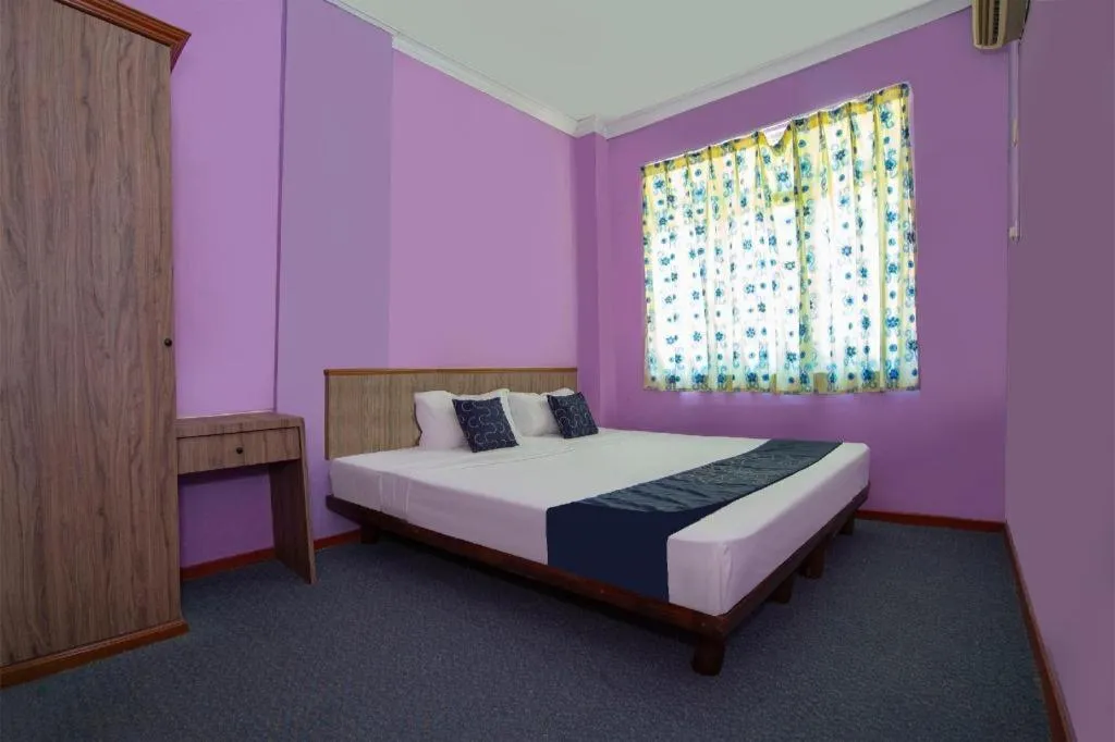 Bed in Capital O 89876 Safari Hotel