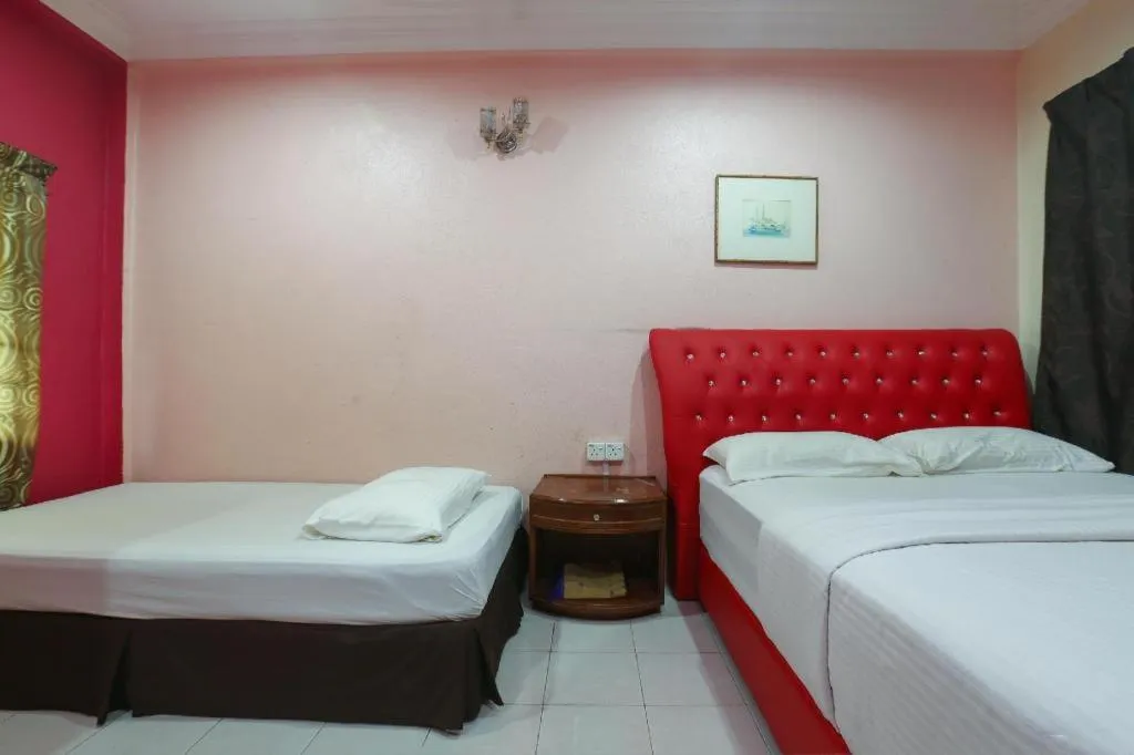 Bed in OYO 89892 Hotel Jeli Inn