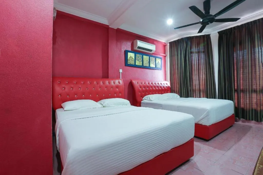 Bed in OYO 89892 Hotel Jeli Inn