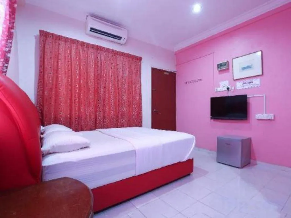 Bed in OYO 89892 Hotel Jeli Inn