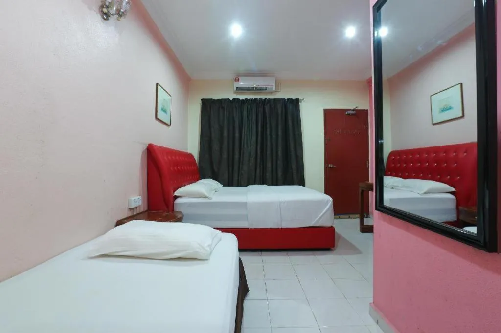 Bed in OYO 89892 Hotel Jeli Inn