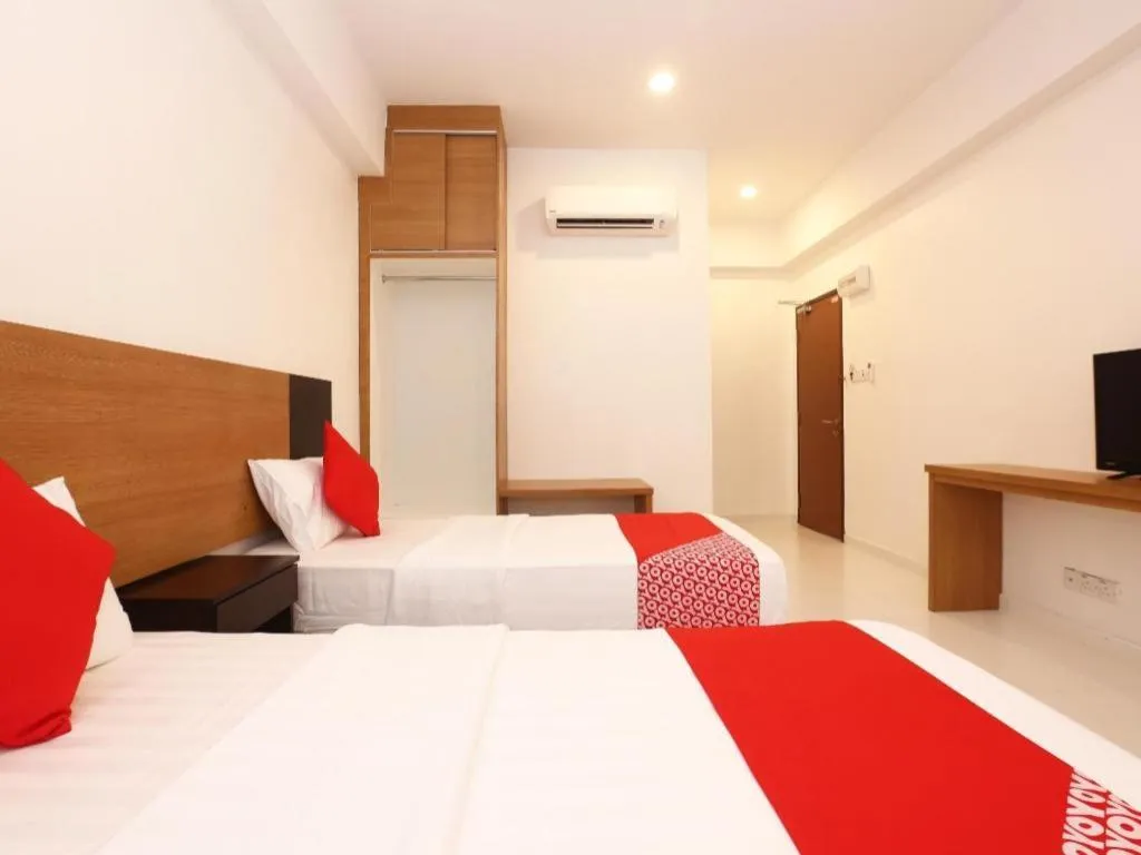 Bed in OYO 89888 DZ Residence Guest House